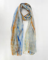 Colorful scarf with blue, orange, and white stripes against a white background